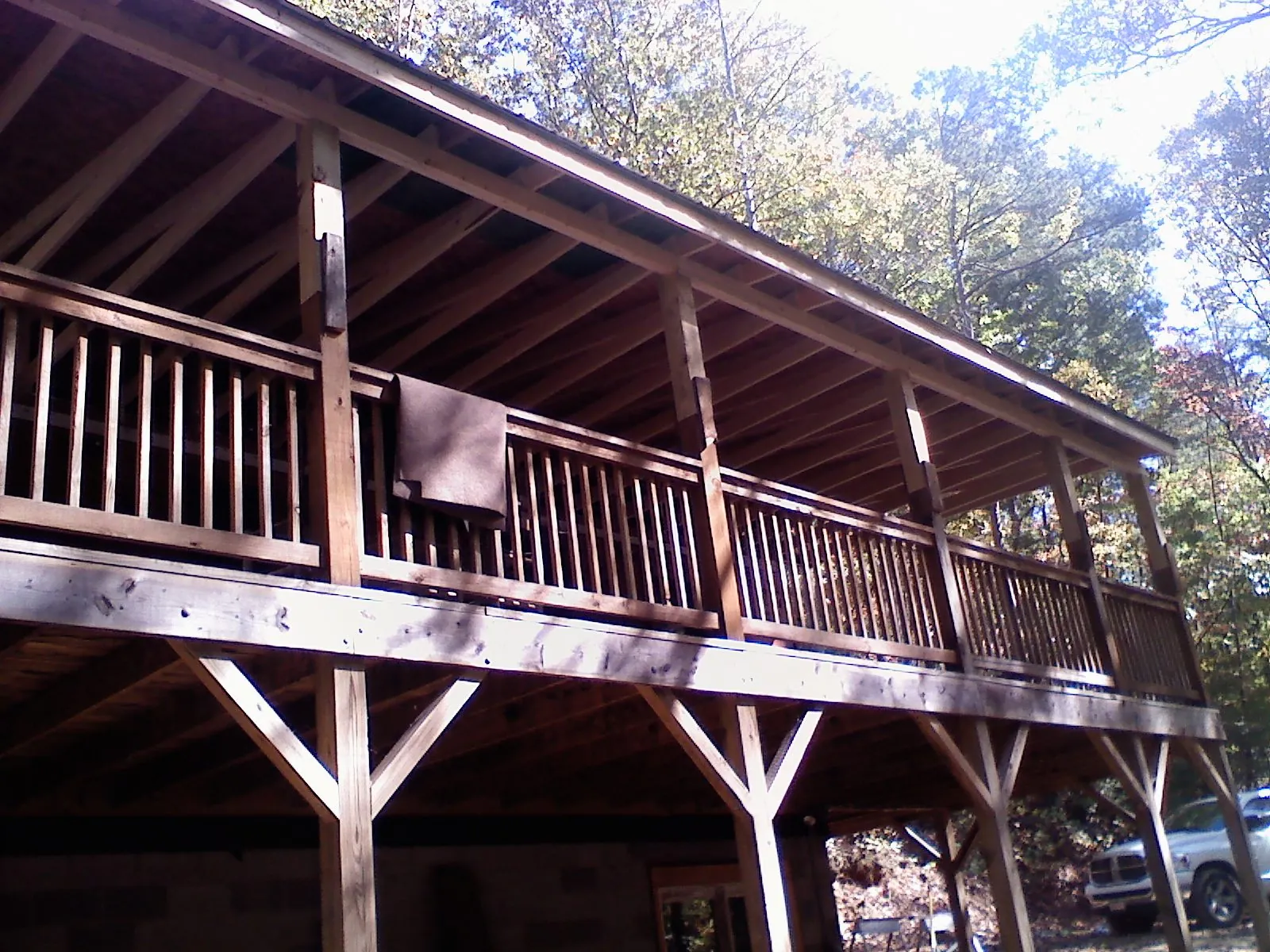 Timber framing under a new elevated porch and deck — Roof Leak Repair in South Sutton by Roofing Brothers